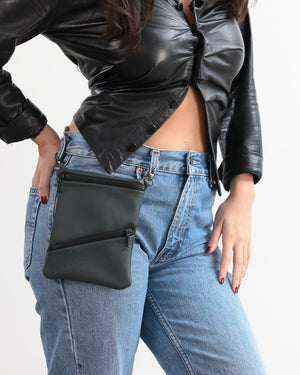 Open image in slideshow, Vertical hip pocket in green with black hardware.
